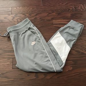 Women’s Nike athletic joggers.  Gray and white detail. Size large.